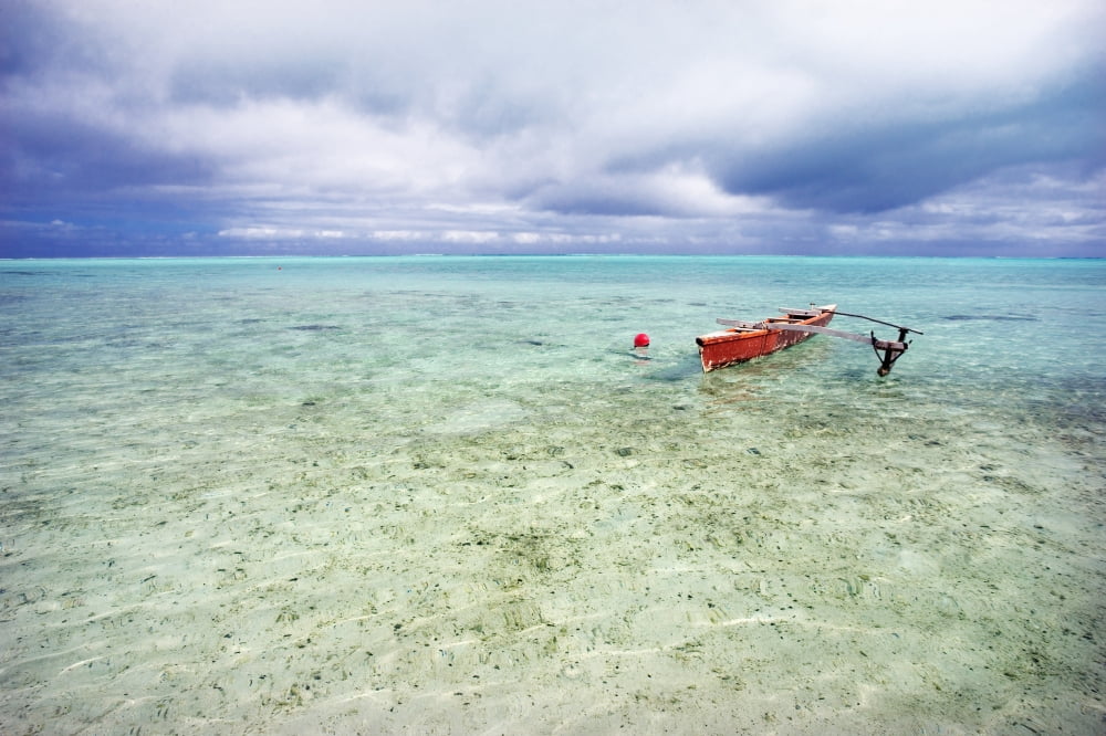 French Polynesia Tahiti Bora Bora Red Outrigger Canoe In Calm Turquoise Water Canvas Art - M Swiet Productions Design Pics (19 x 12)
