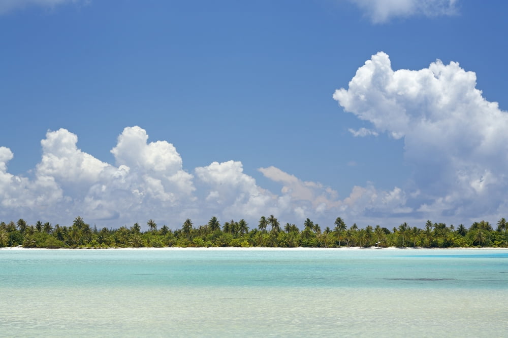French Polynesia Tahiti Island With Bright Blue Sky Maupiti Lagoon Canvas Art - Kyle Rothenborg Design Pics (34 x 22)