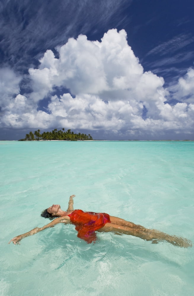 French Polynesia Woman Floating In Ocean Water Canvas Art - M Swiet Productions Design Pics (11 x 17)