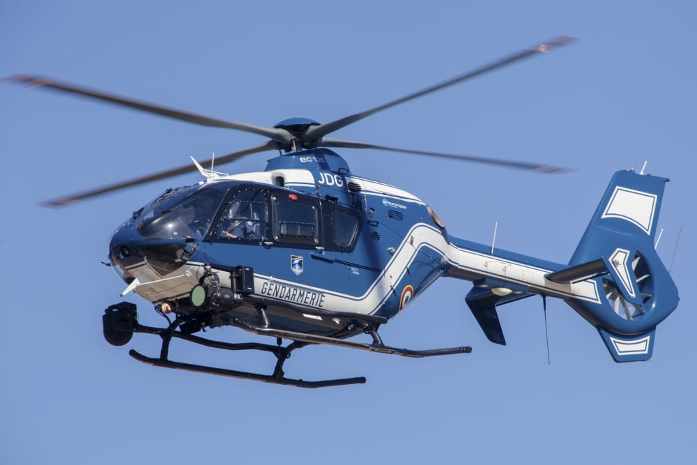 French policegendarmerie EC135 helicopter in flight over France Canvas Art - Timm ZiegenthalerStocktrek Images (17 x 12)