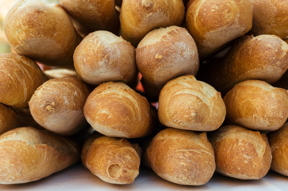 Freshly baked baguettes for sale in a farmers market Canvas Art - Panoramic Images (24 x 36)