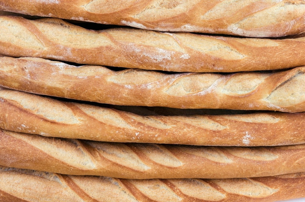 Freshly baked baguettes for sale in a farmers market Canvas Art - Panoramic Images (24 x 36)