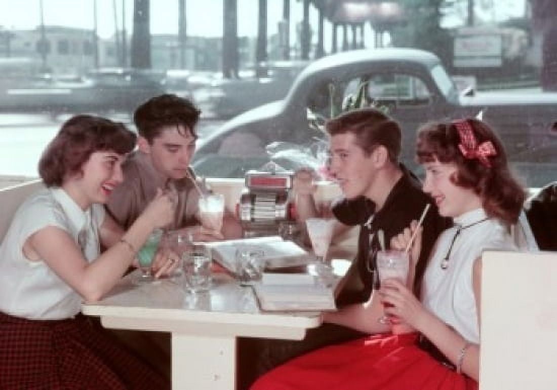 Friends having ice-cream in a restaurant Canvas Art - (24 x 36)