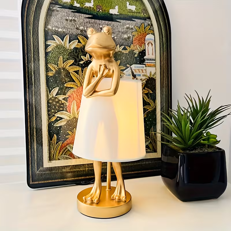 thumbnail image 1 of Frog Table Lamp, 12W E12 Base Candelabra Light Bulb, 3-Way Color Changing Warm, Cool, Daylight, Resin & Metal & PVC Material, Black Desk Lamp for Bedroom, Room Decor[Golden], 1 of 8