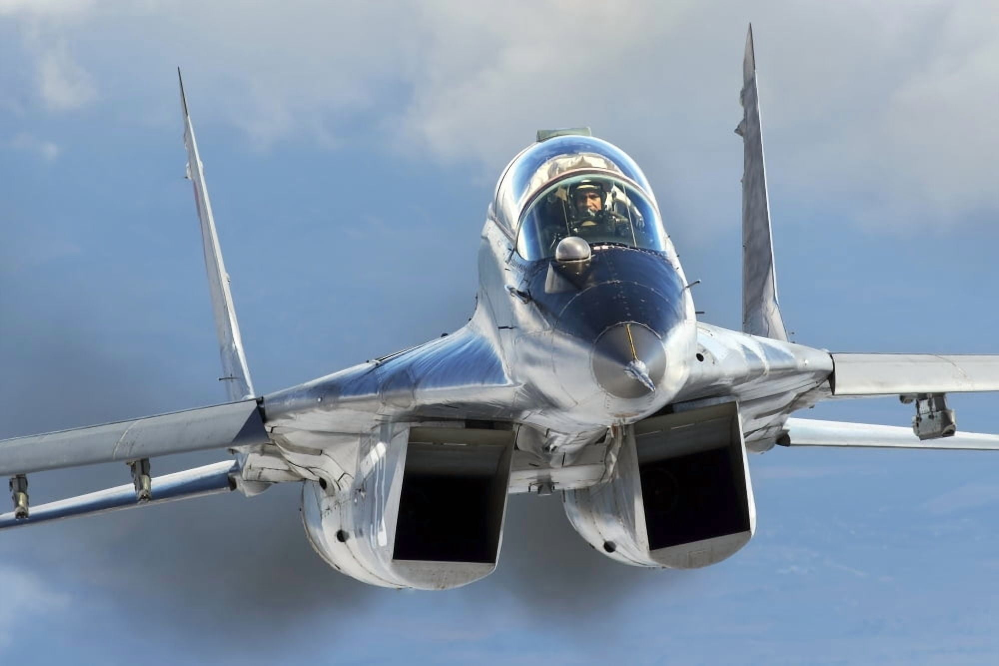 Front view of a Bulgarian Air Force MiG-29s over Bulgaria Canvas Art - Daniele FaccioliStocktrek Images (34 x 23)