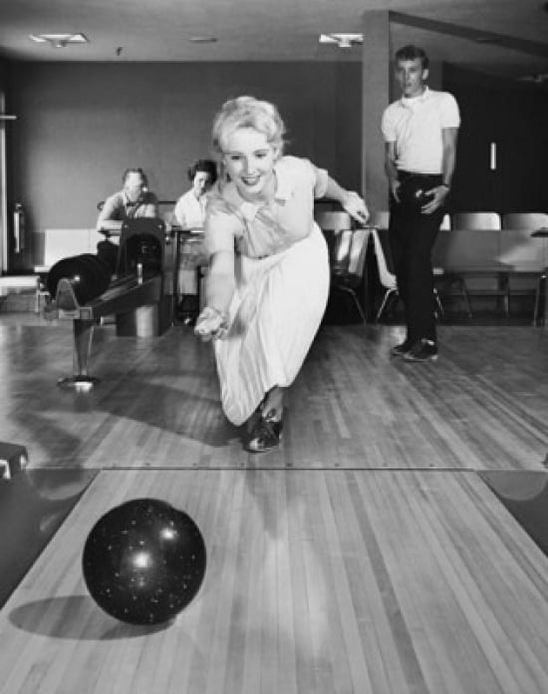 Front view of a family bowling Canvas Art - (18 x 24)