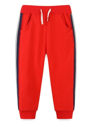 Red bright Tracksuit bottoms with sporty print - Buy Online