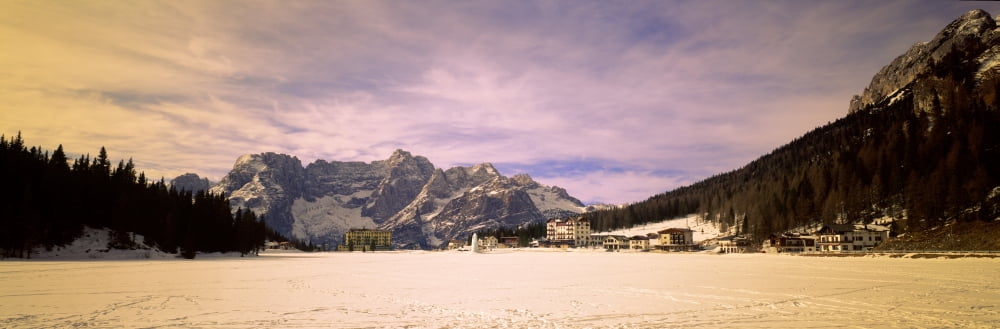 Frozen lake with town at mountainside Lake Misurina Cadore Province of Belluno Veneto Italy Canvas Art - Panoramic Images (12 x 36)
