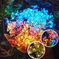 thumbnail image 1 of Fufafayo under $5 Solar String Lights, 16.4ft 20 LED Fairy Blossom Flower Christmas Decorative Lighting for Outdoor Home Lawn Garden Wedding Patio Party and Holiday Decorations, 1 of 9