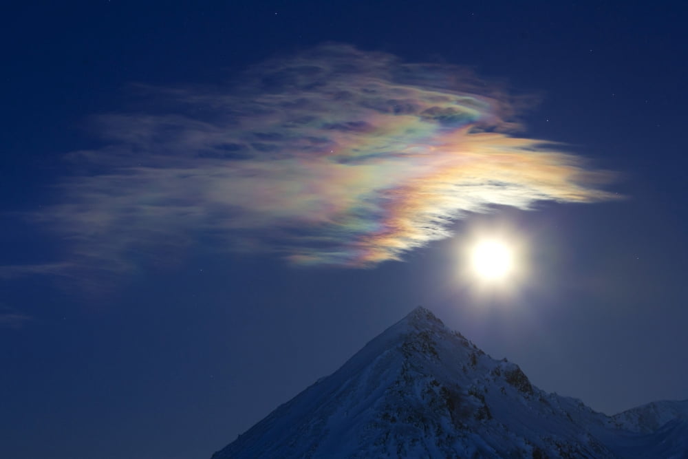 Full moon with rainbow clouds over Ogilvie Mountains Canada Canvas Art - Joseph BradleyStocktrek Images (35 x 23)