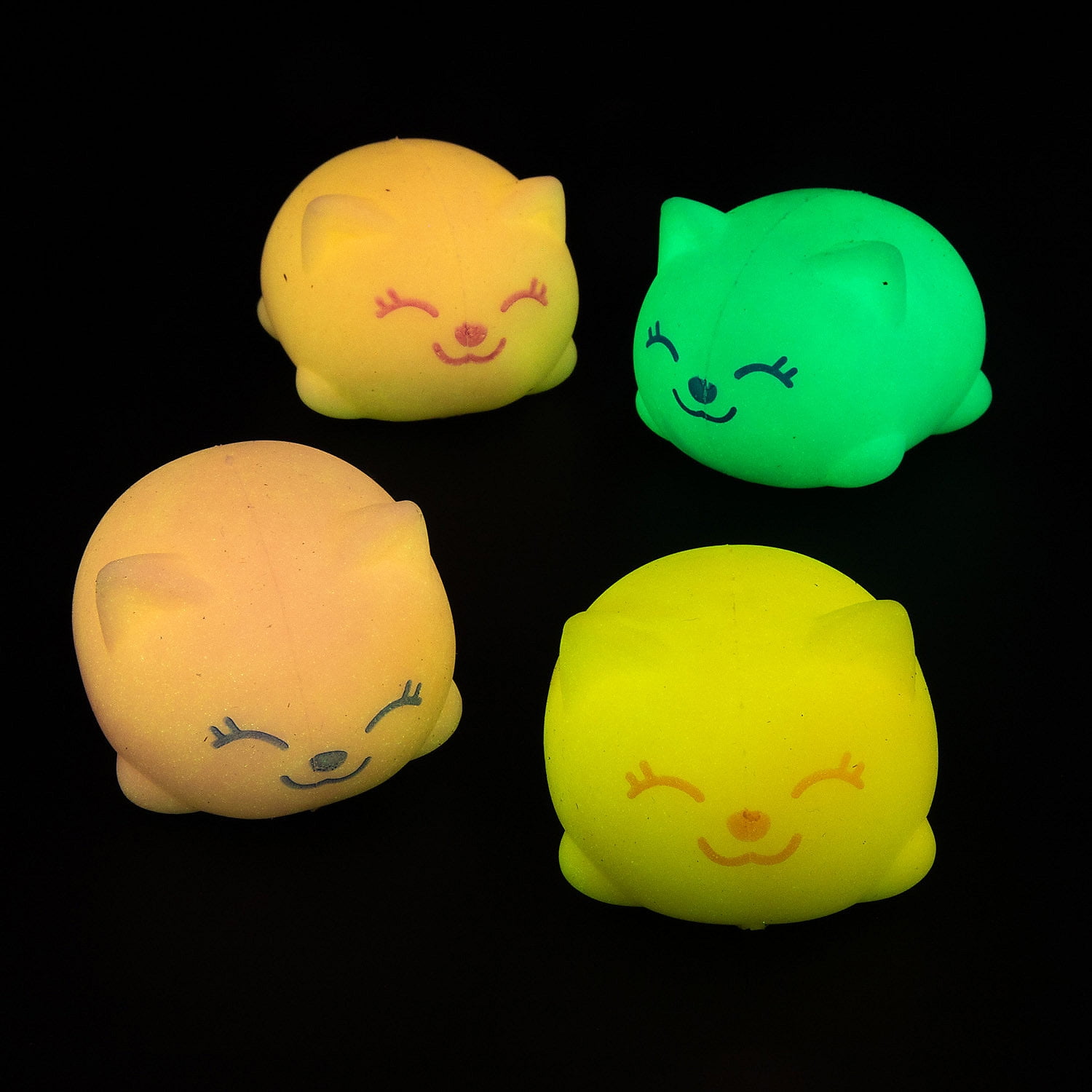 Fun Express 1 1/2" Mini Glow-in-the-Dark Rubber Squeeze Cat Toys - 12 Pieces