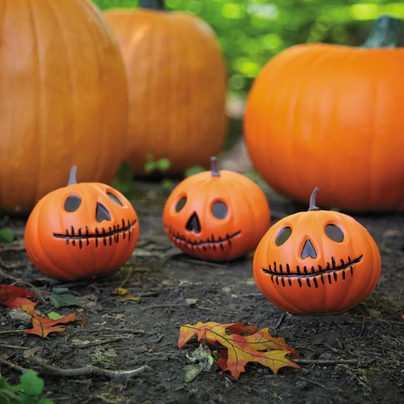 Fun Express 4 3/4" x 12 1/2" Bag of Orange Pumpkin Head Jack-O'-Lanterns Halloween Decoration - Set of 3