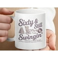 thumbnail image 1 of Funny 60th Birthday Mug: Sixty and Still Swingin', 1 of 5