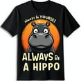 thumbnail image 1 of Funny Black T-Shirt with Cute Cartoon Hippo & Uplifting Quote Design, 1 of 5