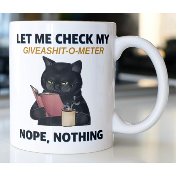 Funny Cat drinking Coffee mug stating “Let me check my Give-o-shit meter; Nope, nothing”