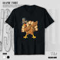 thumbnail image 1 of Funny Dabbing Turkey Thanksgiving Pilgrim for Men Boys Unisex T-Shirt up to Size 5XL, 1 of 2