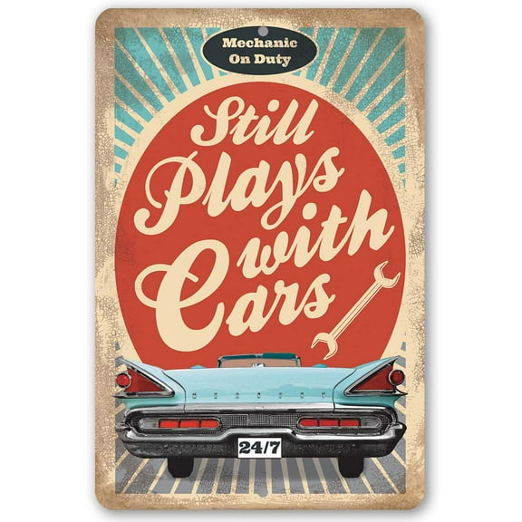 Funny Metal Sign - Still Plays With Cars - Durable Metal Sign - Use Indoor/Outdoor - Makes a Great Garage Decor and Gift for Mechanics Under $20 (8" x 12")