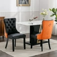 thumbnail image 1 of GAKMCIL PU Leather Dining Chairs (Set of 2), Modern Velvet Dining Chair with Nailhead Back and Ring Pull Trim, Solid Wood Legs, 350lb Load for Dining Room, Kitchen and Living Room (Black&Orange), 1 of 12