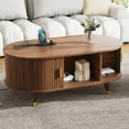 thumbnail image 1 of GDF Studio 42.5" Mid-Century Oval Fluted Coffee Table with Charging Station, Sliding Doors, Walnut, 1 of 7
