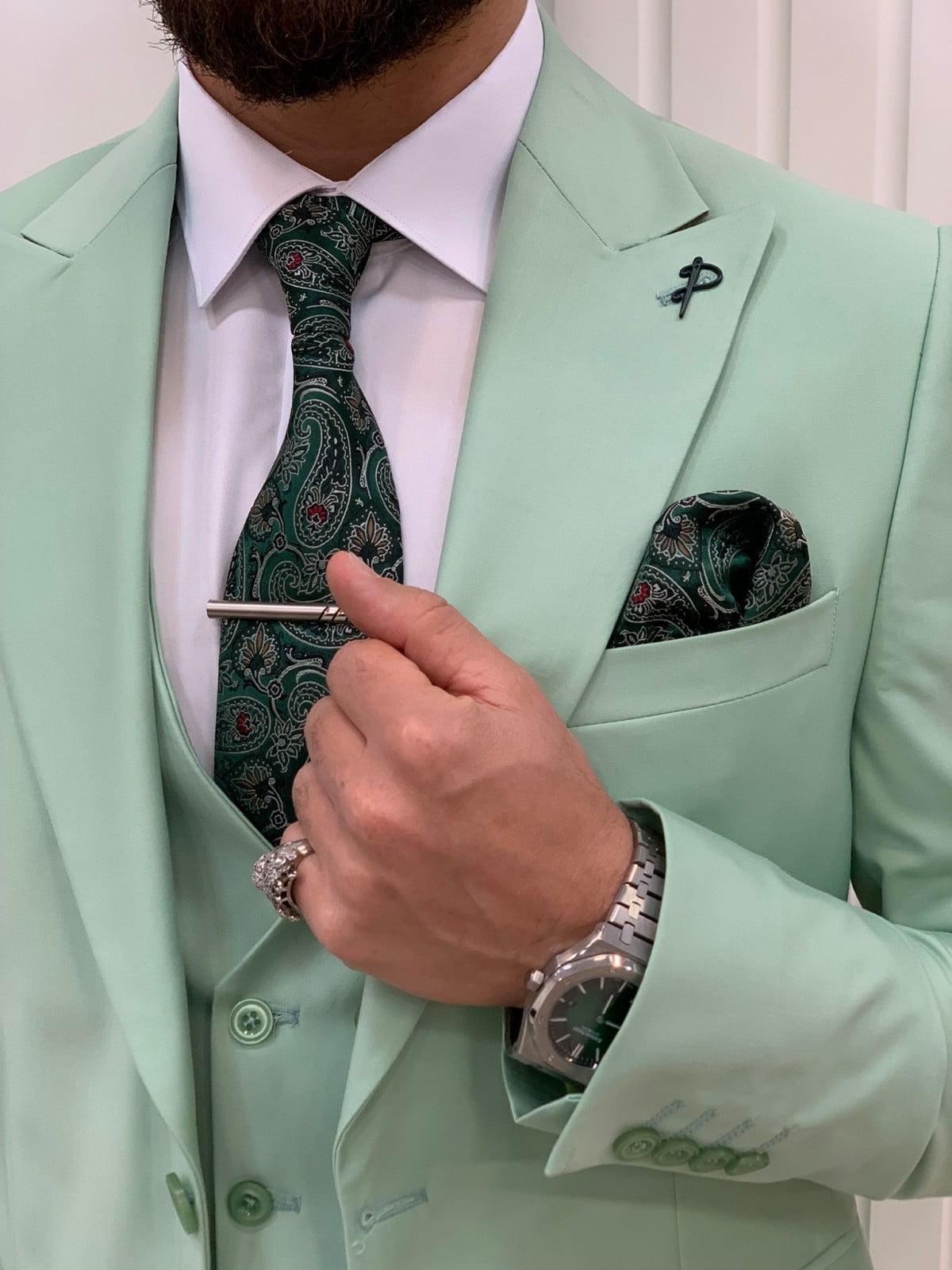 green pant coat with tie