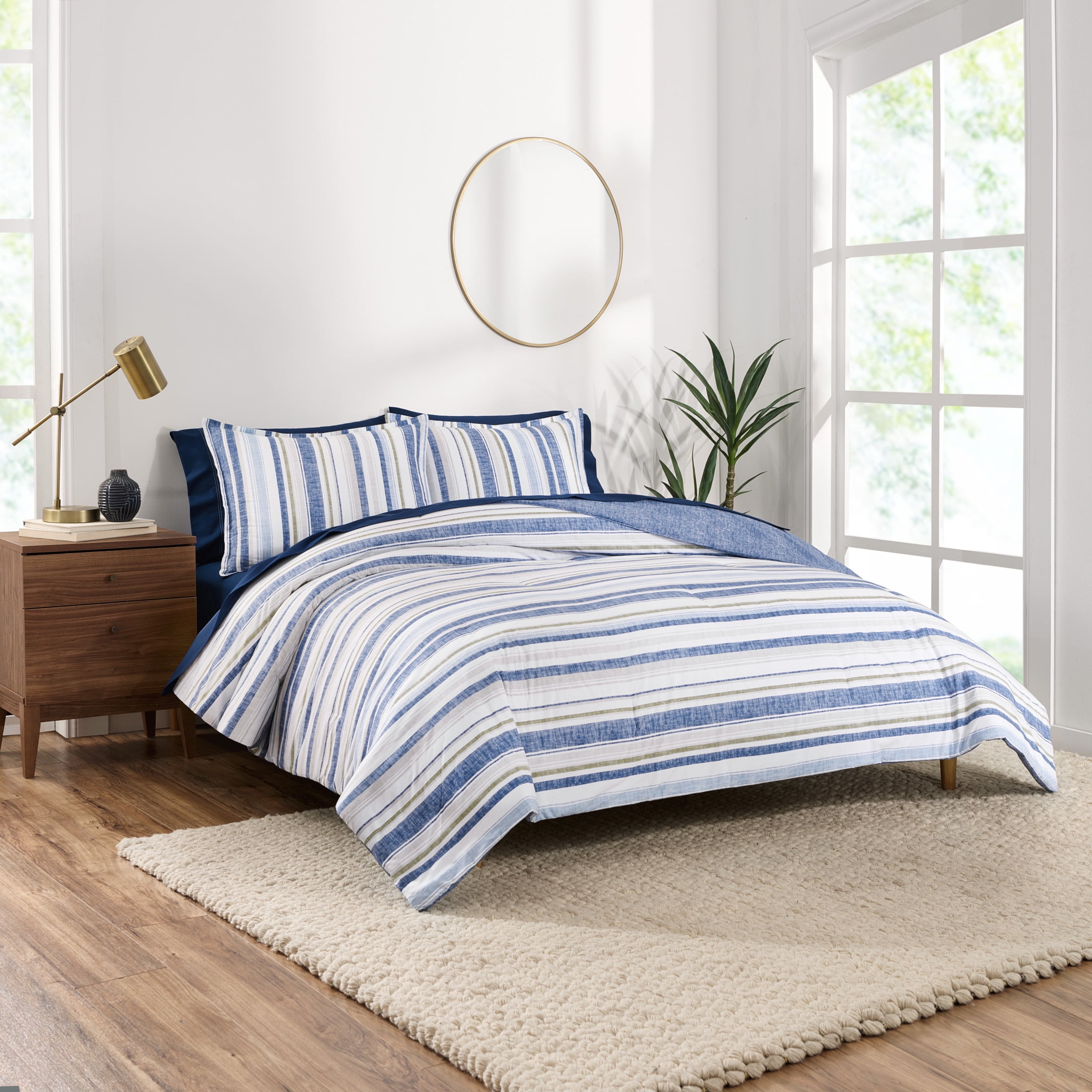 Blue and white top striped twin comforter