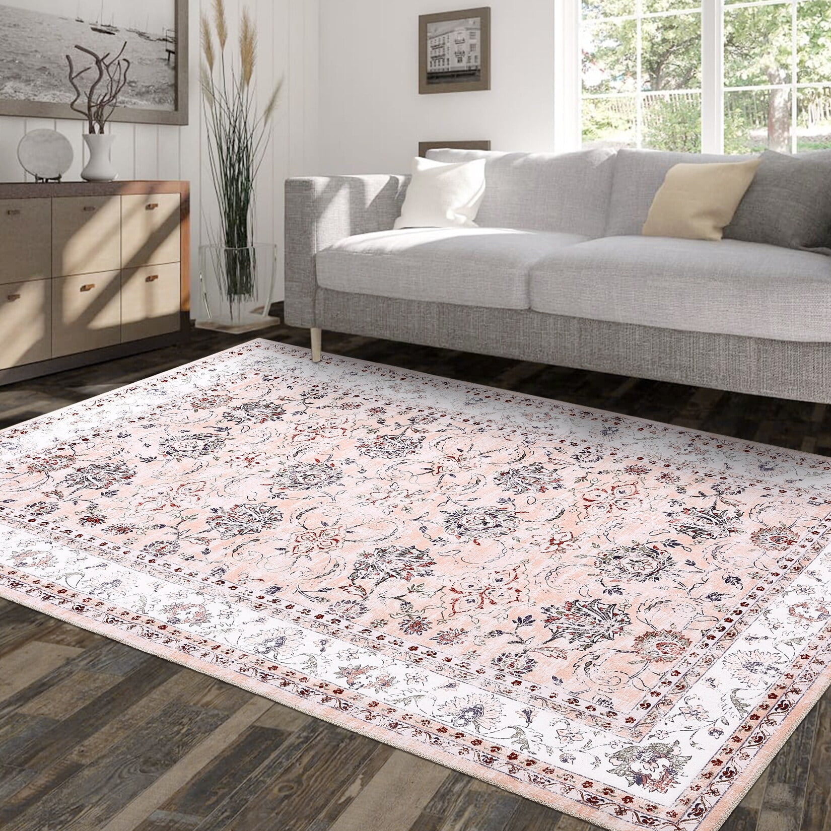 8' x 10' Pink and White Synthetic Floral Area Rug