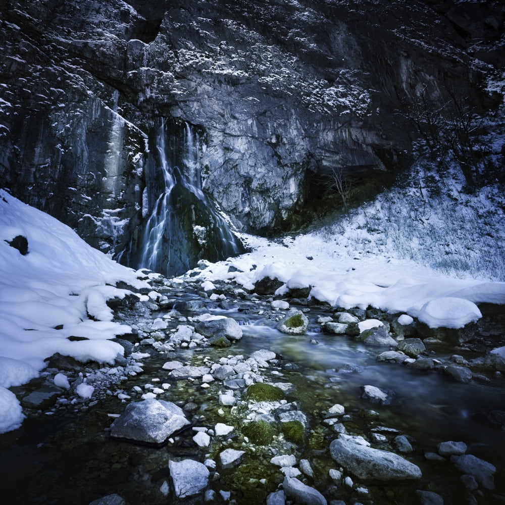 Gegskiy waterfall in the snowy mountains of Ritsa Nature Reserve Canvas Art - Evgeny KuklevStocktrek Images (29 x 29)