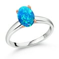 thumbnail image 1 of Gem Stone King 0.56 Ct Oval Cabochon Blue Simulated Opal 925 Silver and 10K Rose Gold Ring Ring (Size 7), 1 of 4