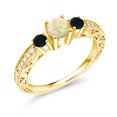 thumbnail image 1 of Gem Stone King 0.63 Ct White Ethiopian Opal Black Onyx 18K Yellow Gold Plated Silver Ring (Size 5), 1 of 4