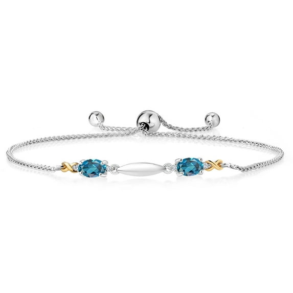 Gem Stone King 1.24 Ct Oval London Blue Topaz 925 Silver and 10K Yellow Gold Lab Grown Diamond Bracelet for Women