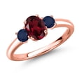 thumbnail image 1 of Gem Stone King 18K Rose Gold Plated Silver Red Rhodolite Garnet and Blue Sapphire Engagement Ring for Women | 1.34 Cttw | Oval 7X5MM | Gemstone January Birthstone | Size 8, 1 of 6