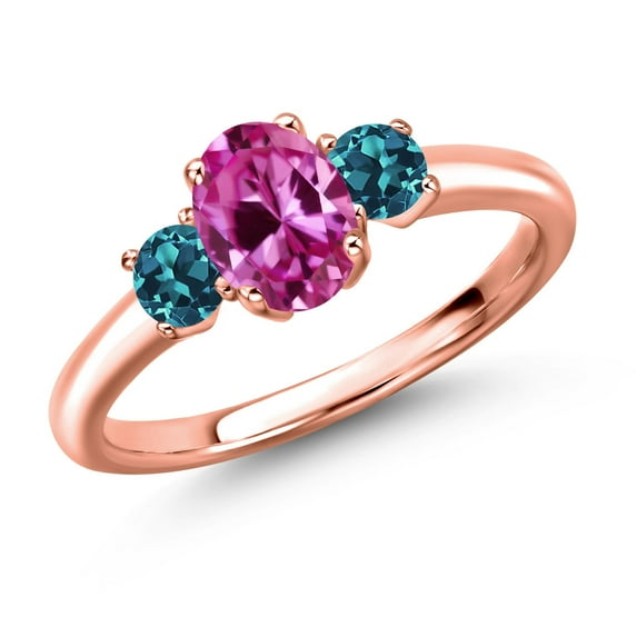 Gem Stone King 18K Rose Gold Plated Silver Pink Created Sapphire and London Blue Topaz Engagement Ring for Women | 1.34 Cttw | Oval 7X5MM | Gemstone September Birthstone | Size 5