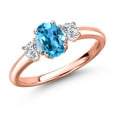 thumbnail image 1 of Gem Stone King 18K Rose Gold Plated Silver Swiss Blue Topaz and Lab Grown Diamond Engagement Ring for Women | 1.34 Cttw | Oval 7X5MM | Gemstone November Birthstone | Size 9, 1 of 6