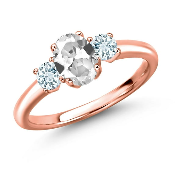 Gem Stone King 18K Rose Gold Plated Silver White Created Sapphire and Sky Blue Aquamarine Engagement Ring for Women | 1.34 Cttw | Oval 7X5MM | Gemstone September Birthstone | Size 9