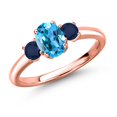 thumbnail image 1 of Gem Stone King 18K Rose Gold Plated Silver Swiss Blue Topaz and Blue Sapphire Engagement Ring for Women | 1.44 Cttw | Oval 7X5MM | Gemstone November Birthstone | Size 8, 1 of 6