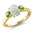 thumbnail image 1 of Gem Stone King 1.60 Ct Oval Cabochon White Simulated Opal Green Peridot 18K Yellow Gold Plated Silver Ring (Size 7), 1 of 6