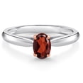 thumbnail image 1 of Gem Stone King 10K 2 Tone Gold Red Garnet Ring for Women (0.57 Cttw, Gemstone January Birthstone, Oval 6X4MM, Available in Size 5, 6, 7, 8, 9), 1 of 4