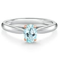 thumbnail image 1 of Gem Stone King 10K 2 Tone Gold Sky Blue Topaz Ring for Women (0.50 Cttw, Gemstone November Birthstone, Oval 6X4MM, Available in Size 5, 6, 7, 8, 9), 1 of 4