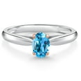 thumbnail image 1 of Gem Stone King 10K 2 Tone Gold Swiss Blue Topaz Ring for Women (0.55 Cttw, Gemstone November Birthstone, Oval 6X4MM, Available in Size 5, 6, 7, 8, 9), 1 of 4