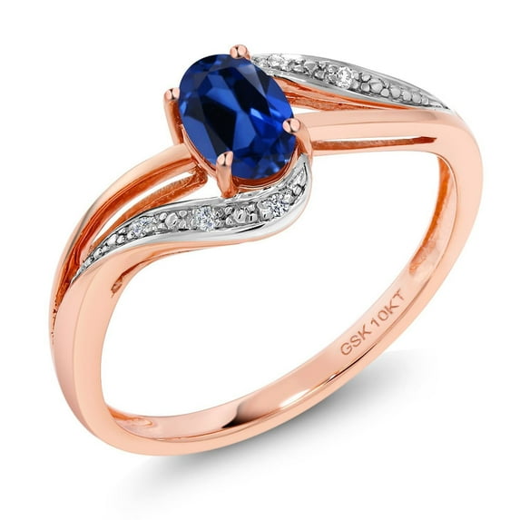 Gem Stone King 10K Rose Gold Blue Created Sapphire and Diamond Women's Engagement Bypass Ring (0.54 Ct, Size 7)