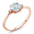 thumbnail image 1 of Gem Stone King 10K Rose Gold Sky Blue Aquamarine and White Created Sapphire Solitaire Engagement Ring for Women (0.78 Cttw, Round 6MM, Gemstone March Birthstone, Size 9), 1 of 6