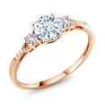 thumbnail image 1 of Gem Stone King 10K Rose Gold Sky Blue Aquamarine White Created Sapphire and White Diamond Accent 3-Stone Engagement Ring for Women (0.89 Cttw, Round 6MM, Gemstone March Birthstone, Size 7), 1 of 6