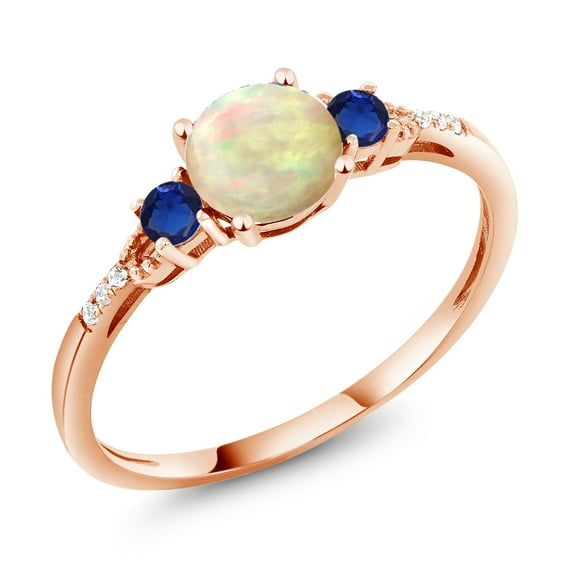 Gem Stone King 10K Rose Gold White Ethiopian Opal Blue Created Sapphire and White Diamond Accent 3-Stone Engagement Ring for Women (0.70 Cttw, Round Cabochon 6MM, Gemstone October Birthstone, Size 6)