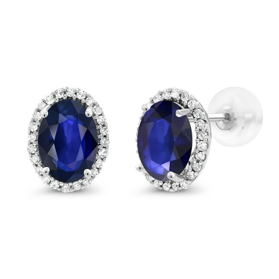 Gem Stone King 10K White Gold Blue Sapphire and White Diamond Halo Stud Earrings for Women | 1.48 Cttw | Gemstone September Birthstone | Oval 7X5MM