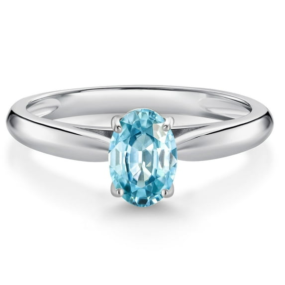 Gem Stone King 10K White Gold Blue Zircon Solitaire Engagement Ring for Women (1.25 Cttw, Oval 7X5MM, Gemstone December Birthstone, Size 9)