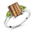 thumbnail image 1 of Gem Stone King 10K White Gold Brown Tiger Eye and Green Peridot 3 Stone Engagement Ring for Women (2.52 Cttw, Emerald Cut 9X7MM, Gemstone Birthstone, Size 6), 1 of 4