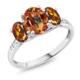 thumbnail image 1 of Gem Stone King 10K White Gold Ecstasy Mystic Topaz Orange Red Madeira Citrine and White Diamond Oval 3-Stone Engagement Ring for Women (2.10 Cttw, Gemstone, Size 8), 1 of 3