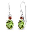 thumbnail image 1 of Gem Stone King 10K White Gold Green Peridot and Red Garnet Dangle Earrings for Women (2.84 Cttw, Gemstone Birthstone, Oval 8x6mm), 1 of 5