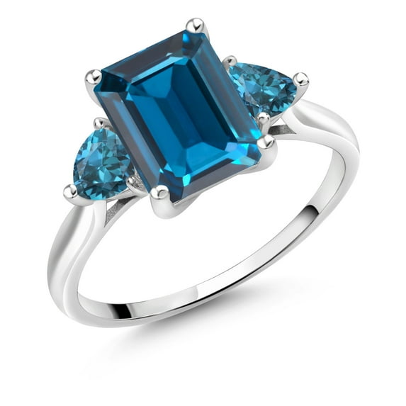 Gem Stone King 10K White Gold London Blue Topaz 3 Stone Engagement Ring for Women (3.23 Cttw, Emerald Cut 9X7MM, Gemstone November Birthstone, Size 8)