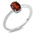 thumbnail image 1 of Gem Stone King 10K White Gold Red Garnet Solitaire Engagement Ring for Women (0.90 Cttw, Oval 7X5MM, Gemstone January Birthstone, Available in Size 5,6,7,8,9), 1 of 3